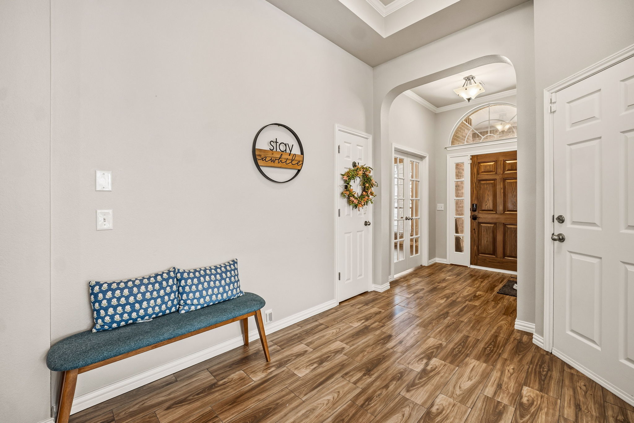 2112 Bandera Path Round Rock, TX 78665 - Photo 3 of 34 a view of a hallway with wooden floor and a window