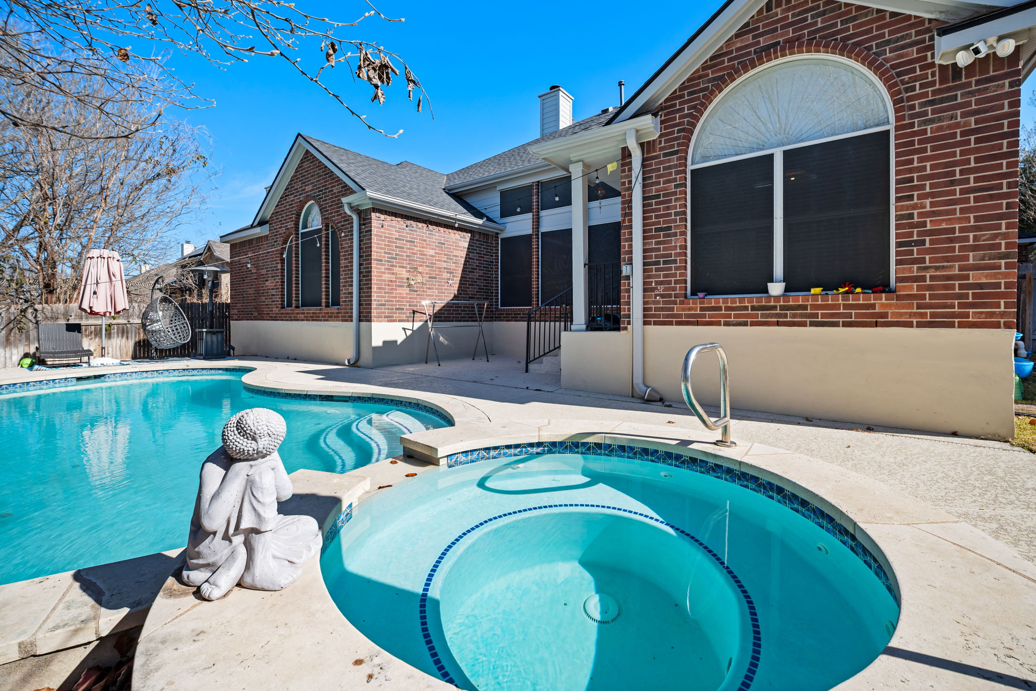 2112 Bandera Path Round Rock, TX 78665 - Photo 33 of 34 a swimming pool with outdoor seating