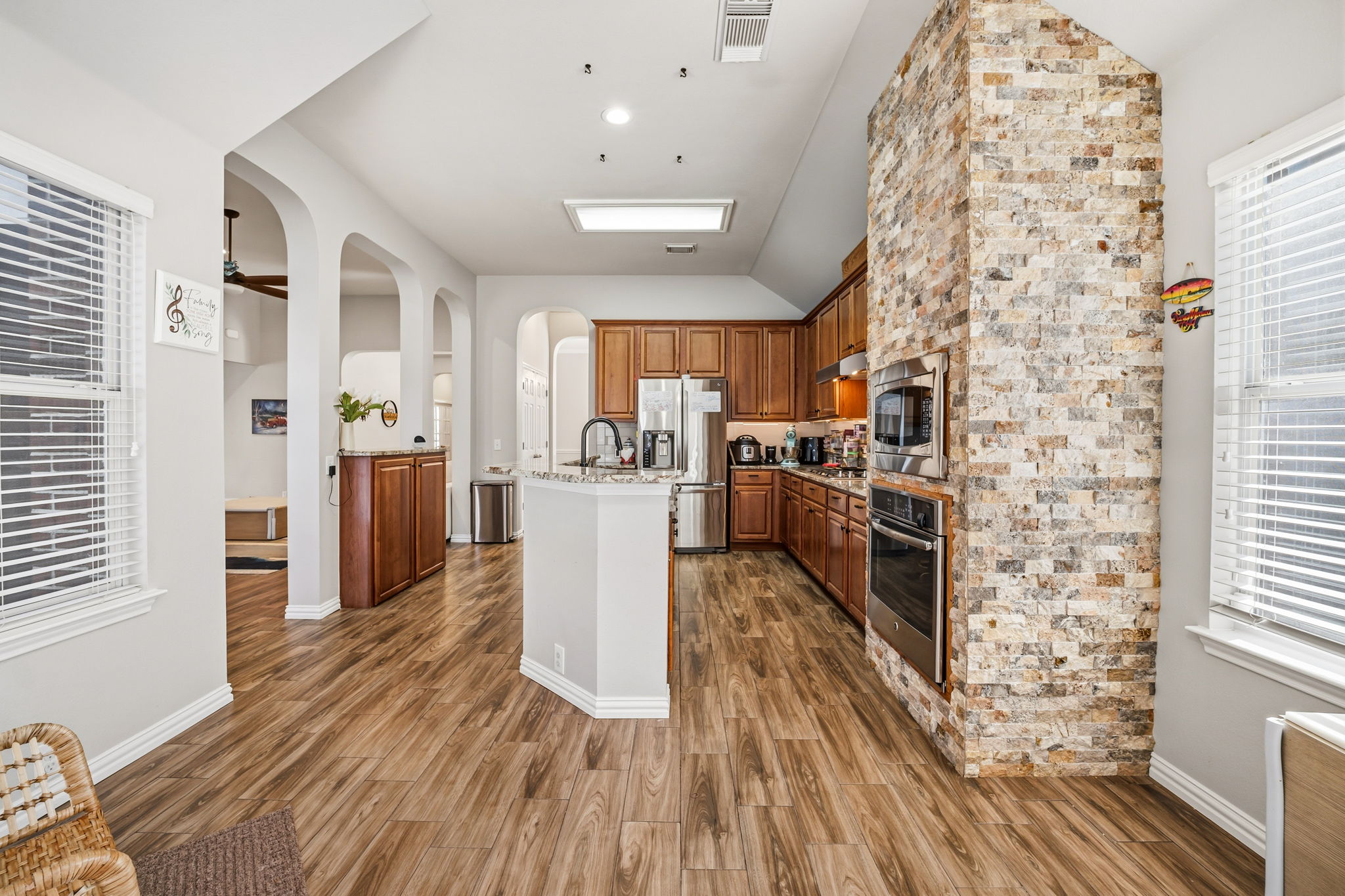 2112 Bandera Path Round Rock, TX 78665 - Photo 10 of 34 a kitchen with cabinets and wooden floor