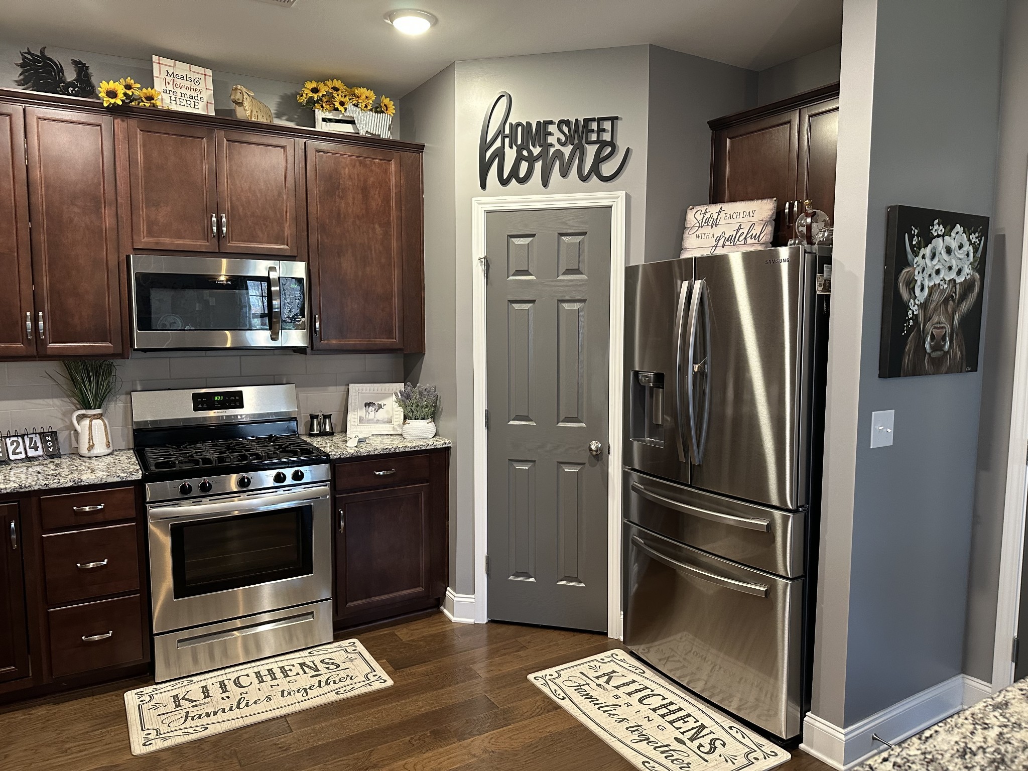 334 Buckner Cir Mount Mount Juliet, TN 37122 - Photo 13 of 44 a kitchen with granite countertop a refrigerator and a stove top oven