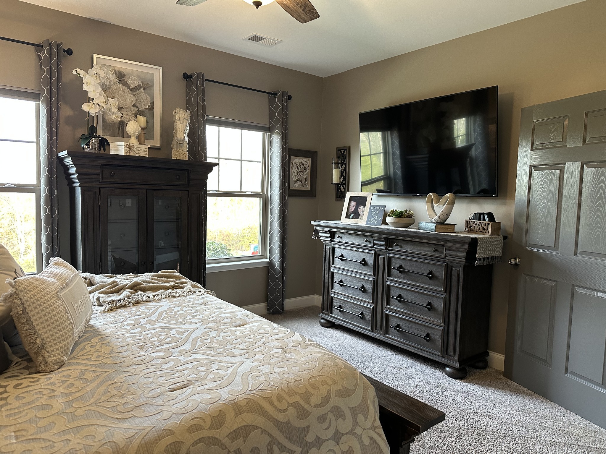 334 Buckner Cir Mount Mount Juliet, TN 37122 - Photo 24 of 44 a bedroom with a bed and a flat screen tv