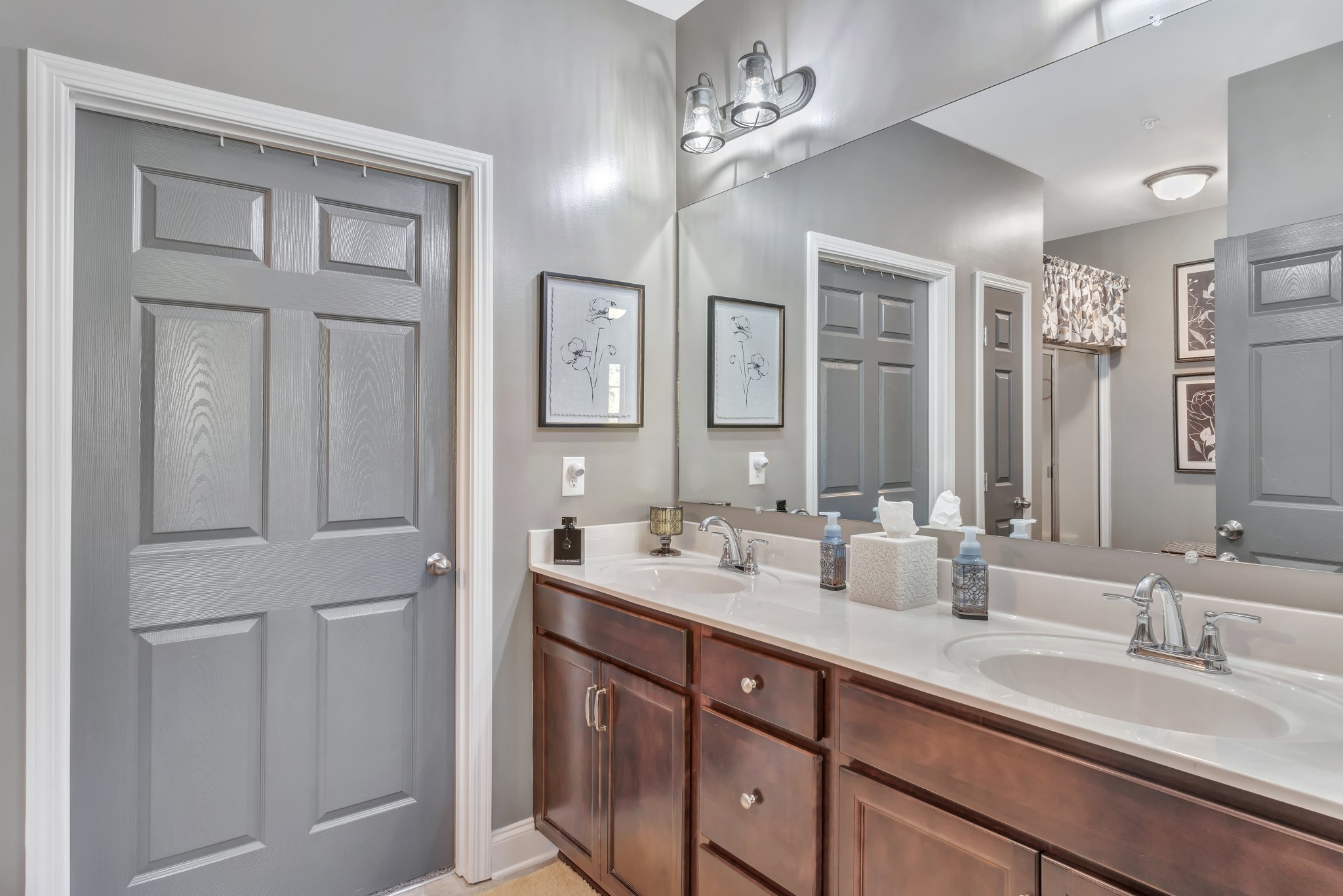 334 Buckner Cir Mount Mount Juliet, TN 37122 - Photo 28 of 44 a bathroom with double vanity sinks a vanity a lamp and a mirror