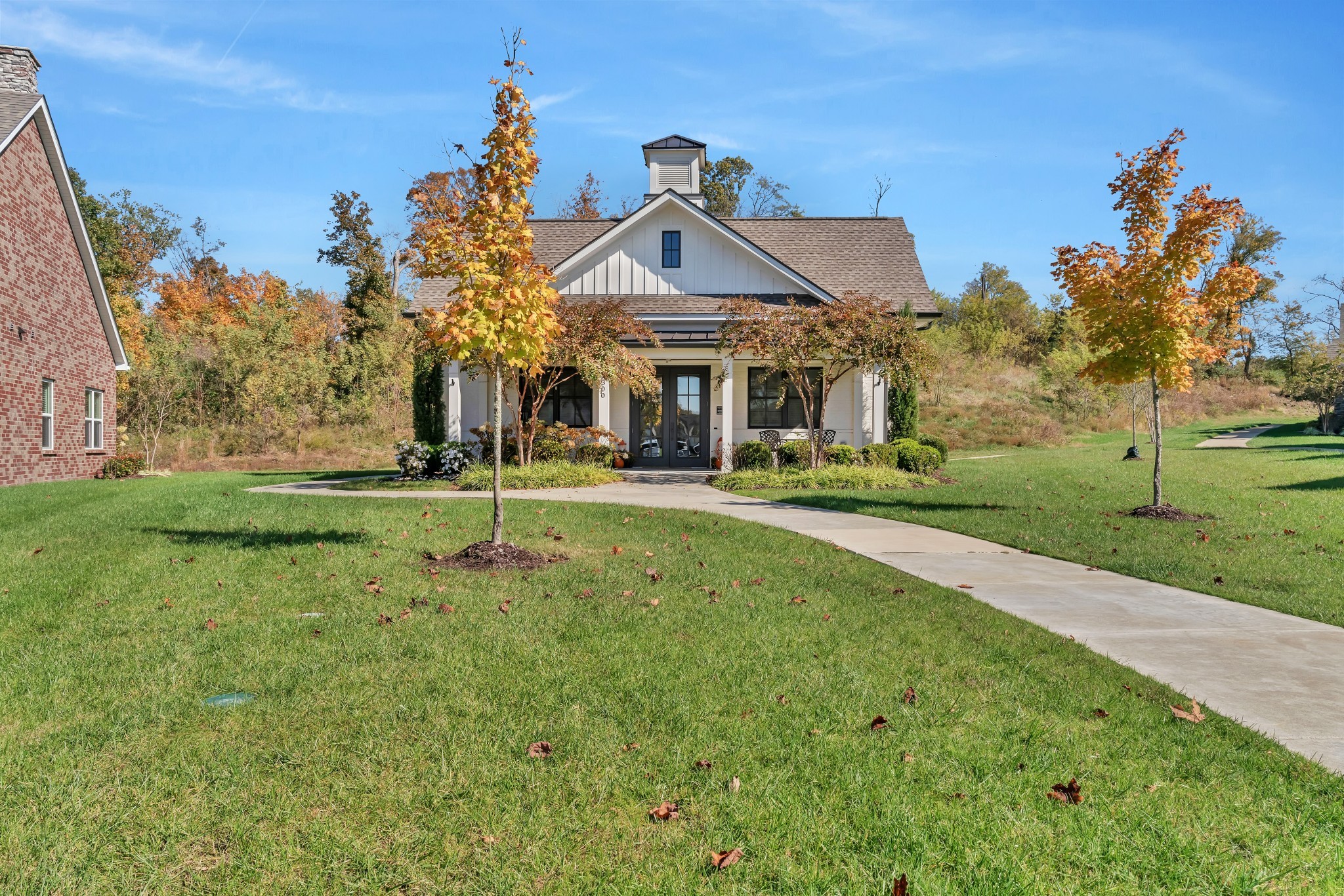 334 Buckner Cir Mount Mount Juliet, TN 37122 - Photo 39 of 44 a front view of a building with a garden