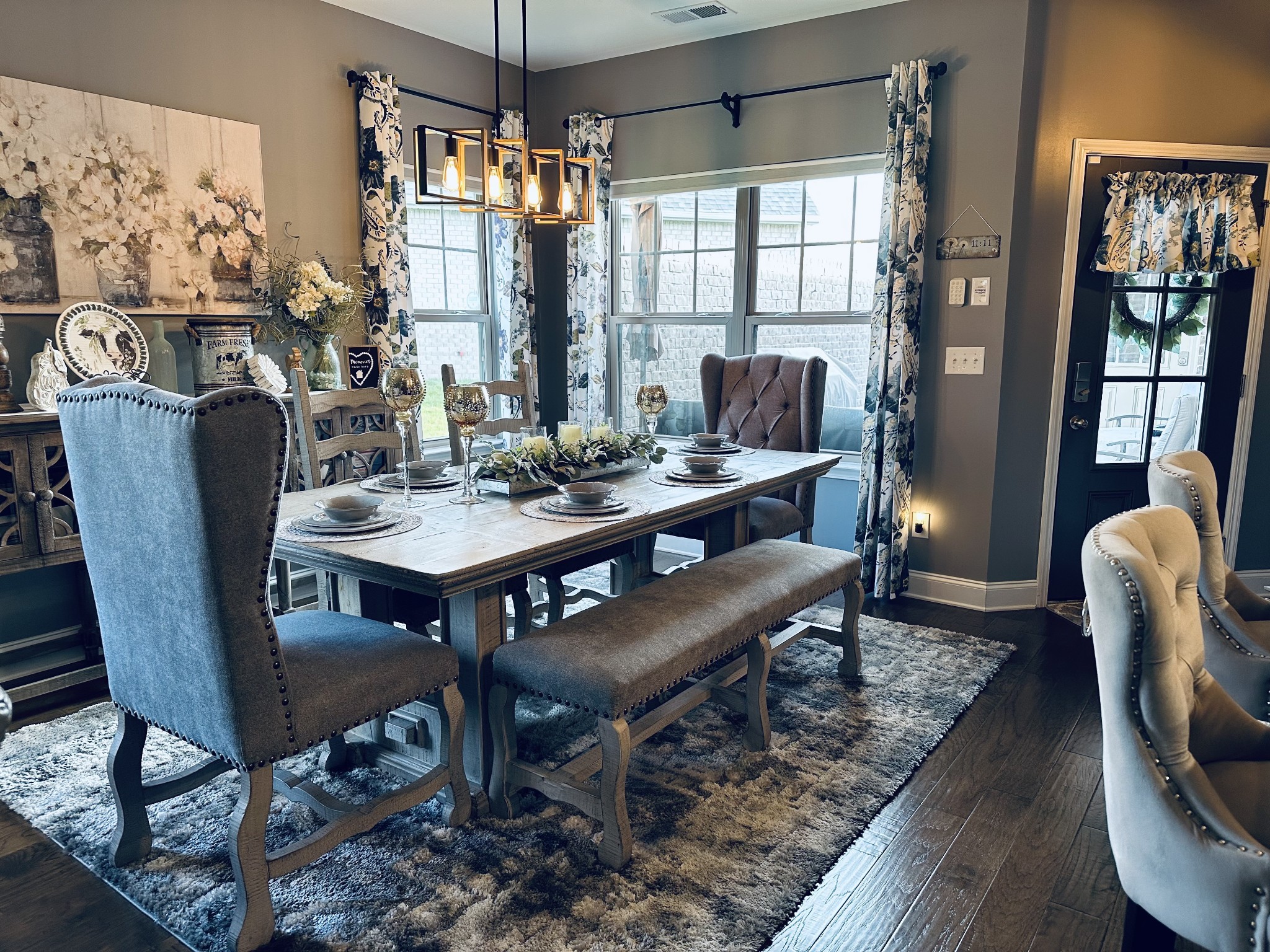 334 Buckner Cir Mount Mount Juliet, TN 37122 - Photo 7 of 44 a dining room with furniture a chandelier and wooden floor