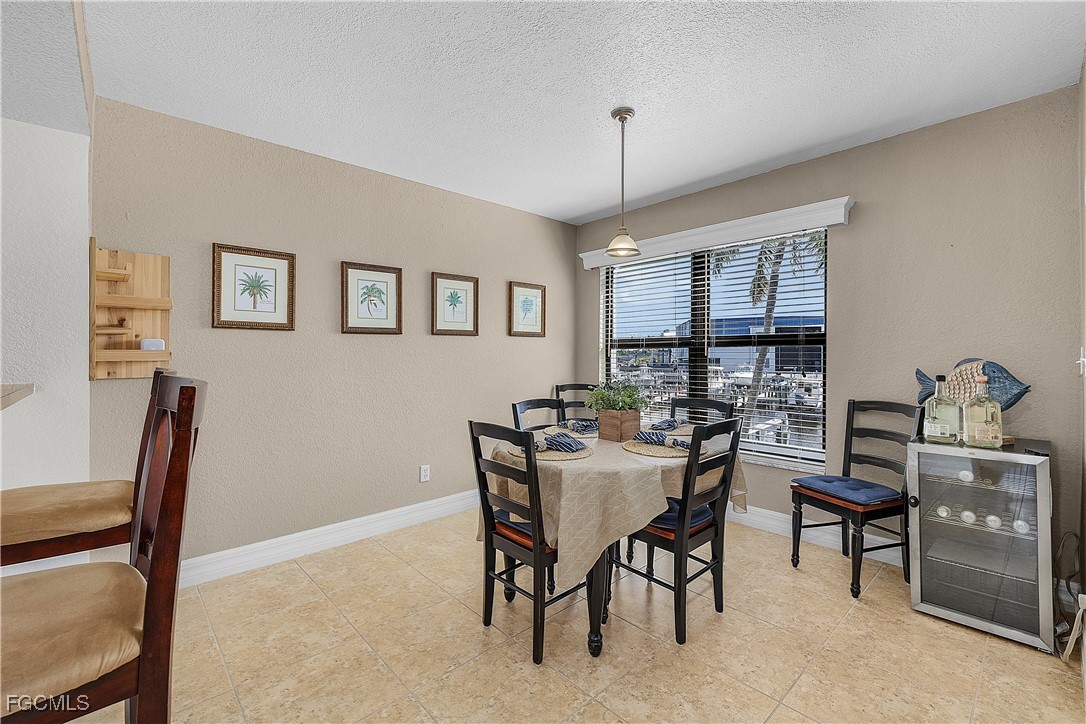 16641 Stringfellow Road, Unit 502 Bokeelia, FL 33922 - Photo 15 of 43 a view of a livingroom and dining room