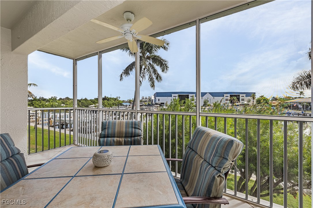 16641 Stringfellow Road, Unit 502 Bokeelia, FL 33922 - Photo 30 of 43 a view of balcony with furniture
