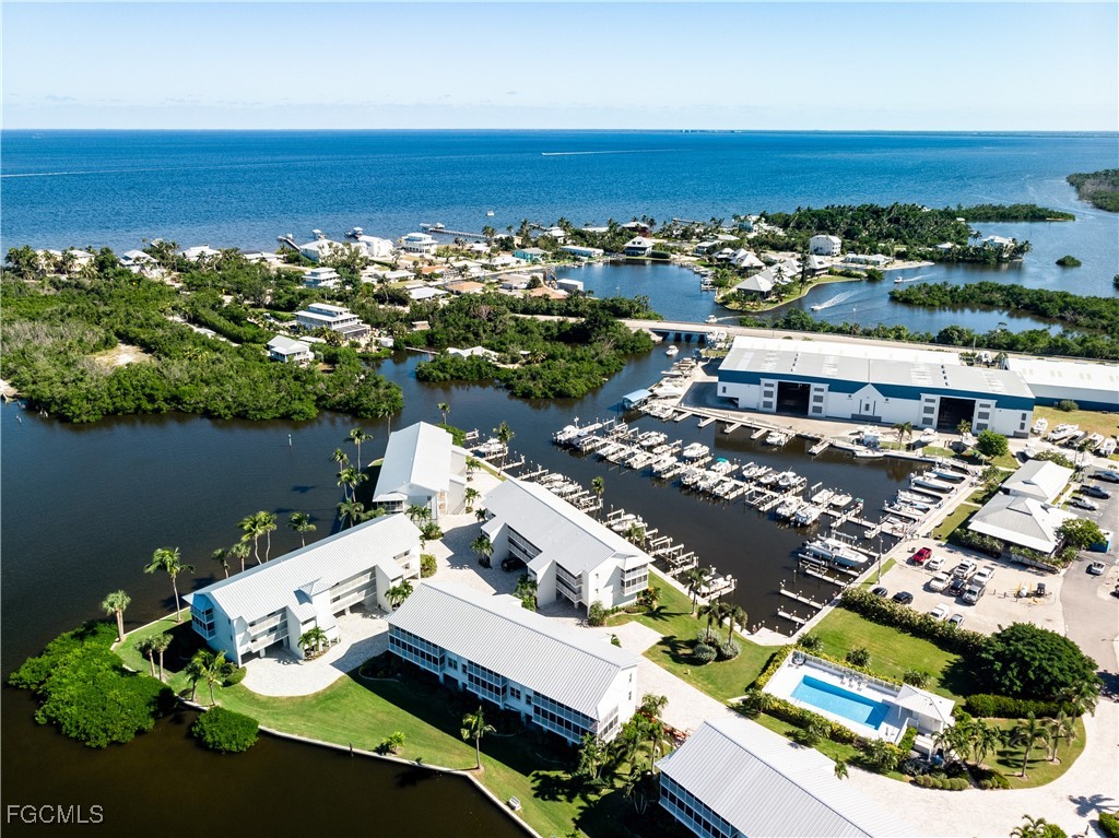 16641 Stringfellow Road, Unit 502 Bokeelia, FL 33922 - Photo 38 of 43 an aerial view of a house with a lake view