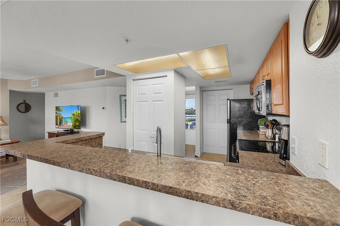 16641 Stringfellow Road, Unit 502 Bokeelia, FL 33922 - Photo 6 of 43 a view of a kitchen area