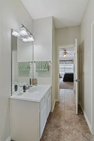 a view of a bathroom sink and mirror