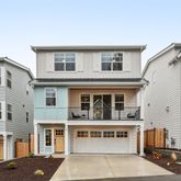 a front view of a building with lot of windows