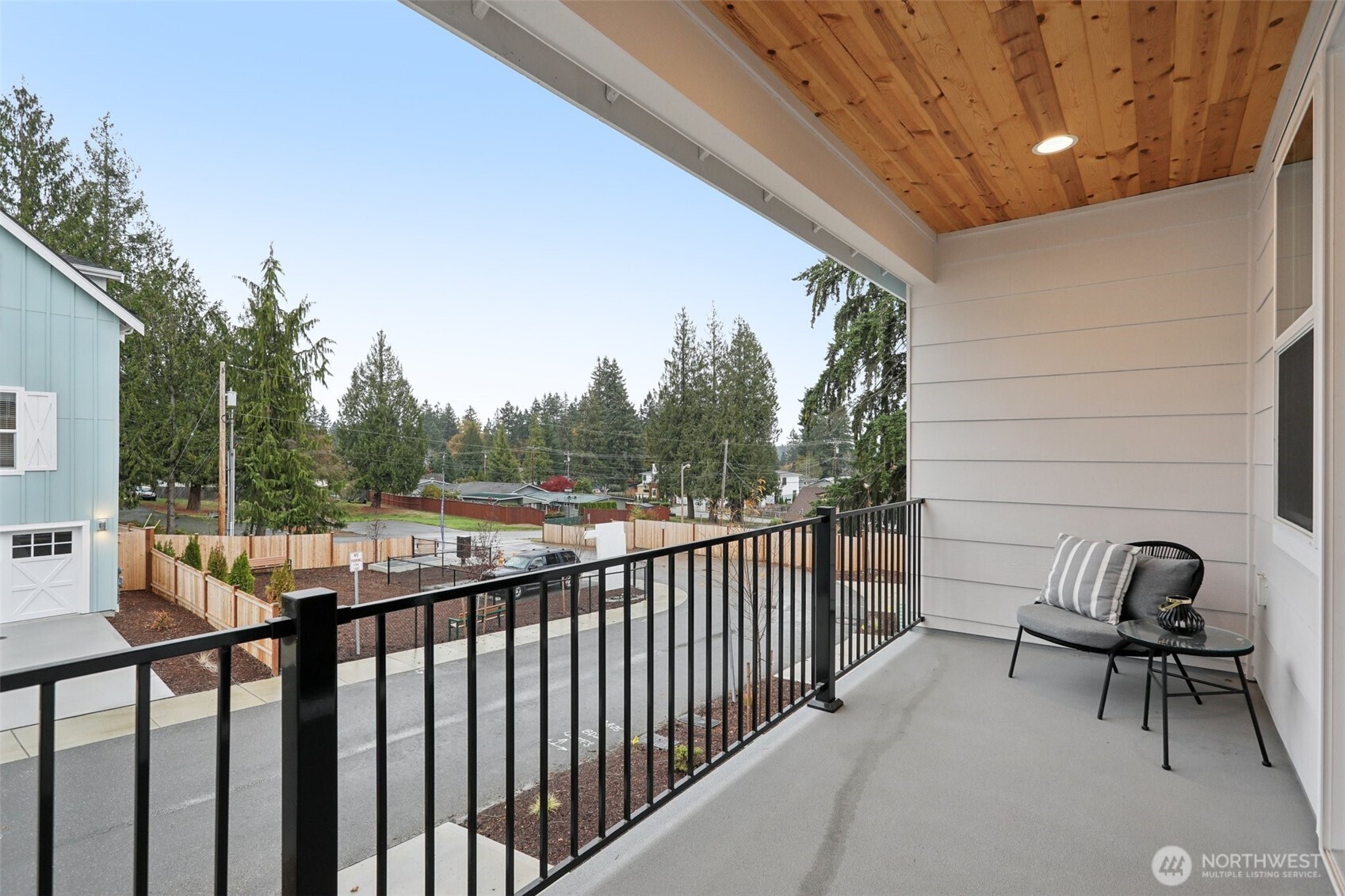 18 160th Place Southeast Bothell, WA 98012 - Photo 11 of 32 a view of a two chairs in the balcony