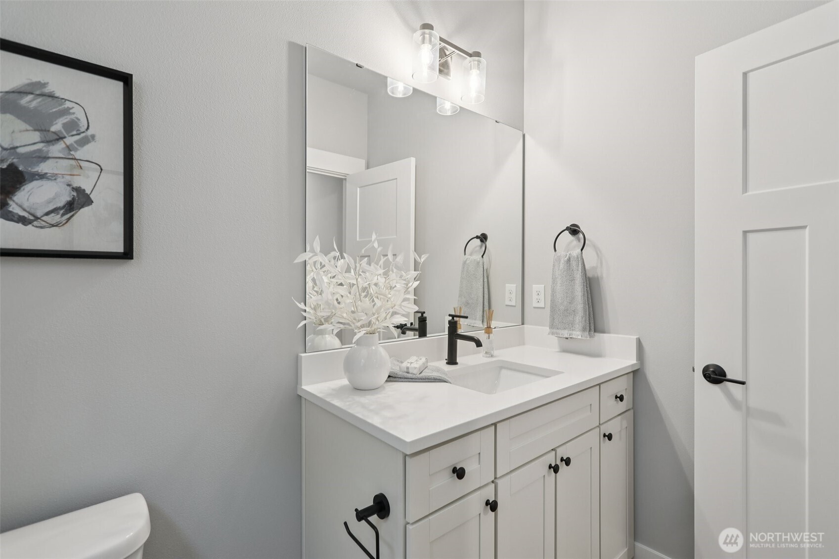 18 160th Place Southeast Bothell, WA 98012 - Photo 14 of 32 a bathroom with a sink and a mirror