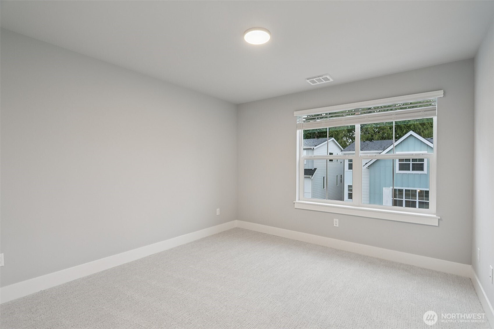 18 160th Place Southeast Bothell, WA 98012 - Photo 22 of 32 an empty room with a window