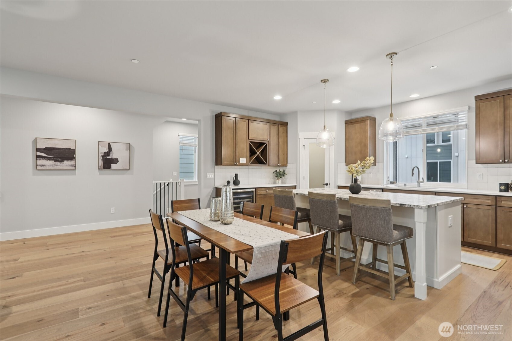 18 160th Place Southeast Bothell, WA 98012 - Photo 4 of 32 a view of a dining room with furniture and wooden floor