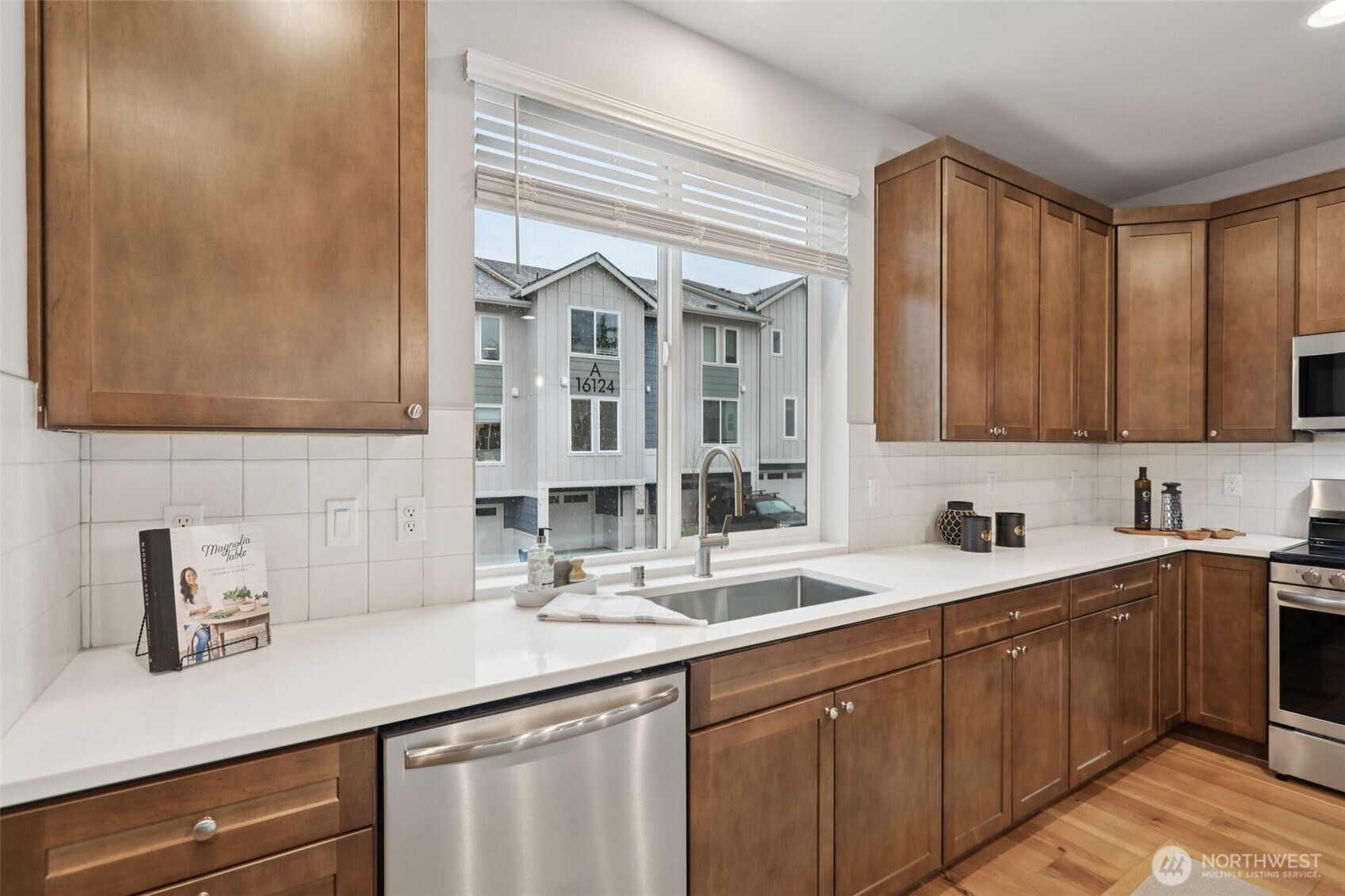 18 160th Place Southeast Bothell, WA 98012 - Photo 6 of 32 a kitchen with a sink and cabinets
