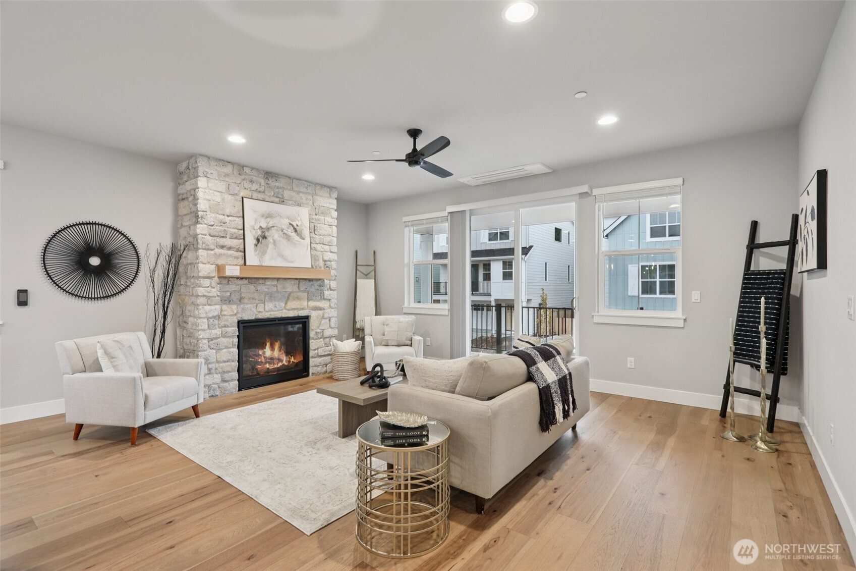 18 160th Place Southeast Bothell, WA 98012 - Photo 10 of 32 a living room with furniture and a fireplace