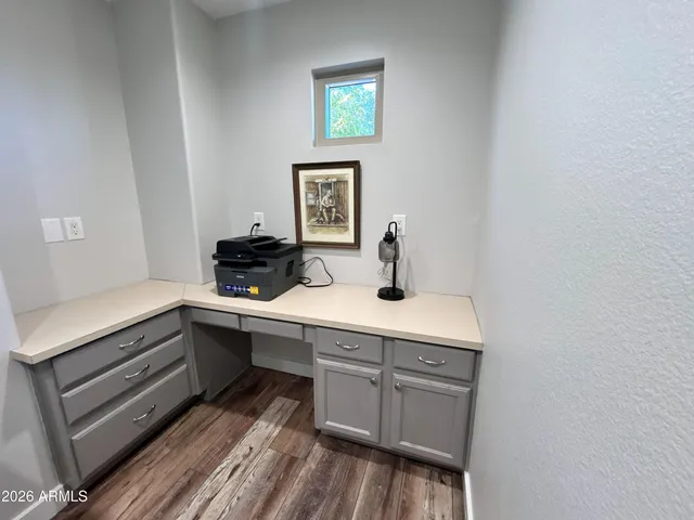 a view of cabinets a sink and dishwasher in a kitchen