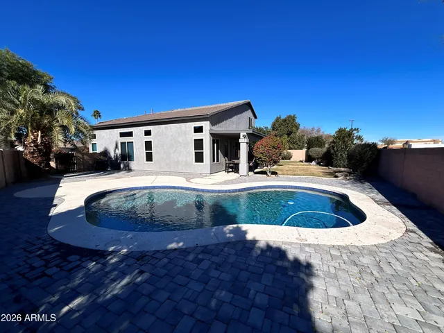 a view of outdoor space yard and swimming pool