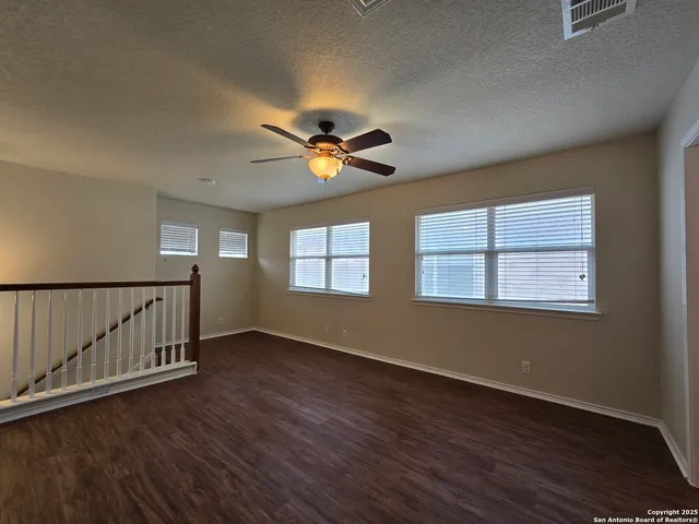 a view of a livingroom with a hardwood floor