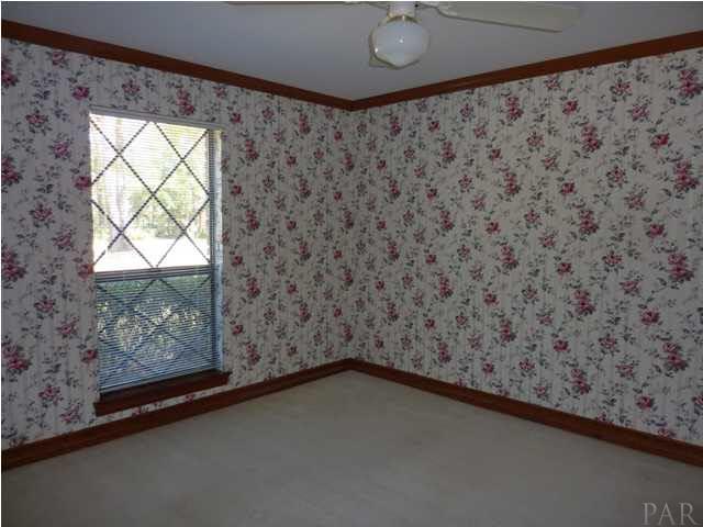 4461 Canopy Road Pensacola, FL 32504 - Photo 11 of 22 Downstairs Bedroom with Walk-in Closet