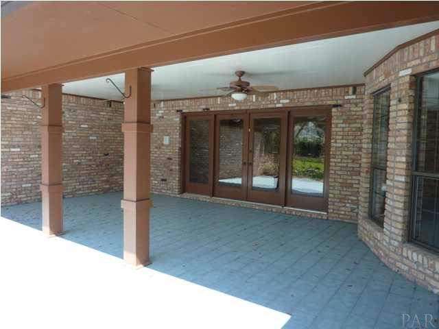 4461 Canopy Road Pensacola, FL 32504 - Photo 8 of 22 Covered Patio Overlooking Backyard