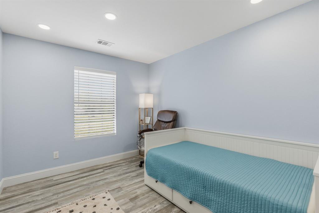 619 Rs County Road 3350 Emory, TX 75440 - Photo 18 of 40 a bedroom with a bed and a window