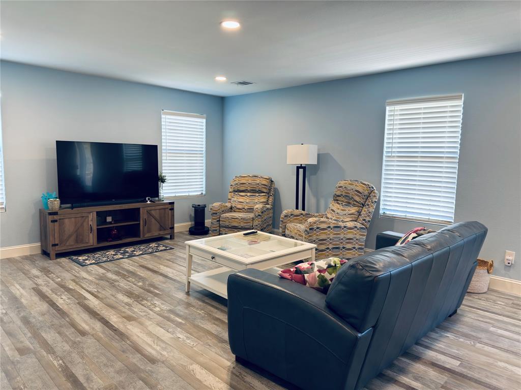 619 Rs County Road 3350 Emory, TX 75440 - Photo 6 of 40 a living room with furniture and a flat screen tv