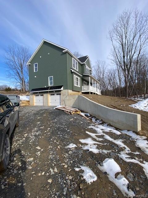 466 Wheeler Road Florida, NY 10921 - Photo 2 of 15 a front view of a house with a yard