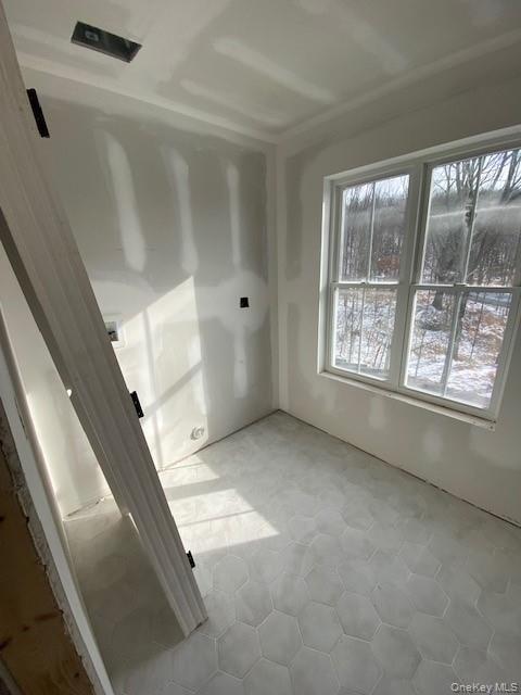 466 Wheeler Road Florida, NY 10921 - Photo 4 of 15 a view of an empty room with windows
