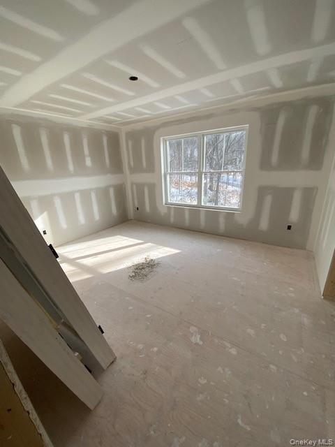 466 Wheeler Road Florida, NY 10921 - Photo 5 of 15 a view of an empty room with a window