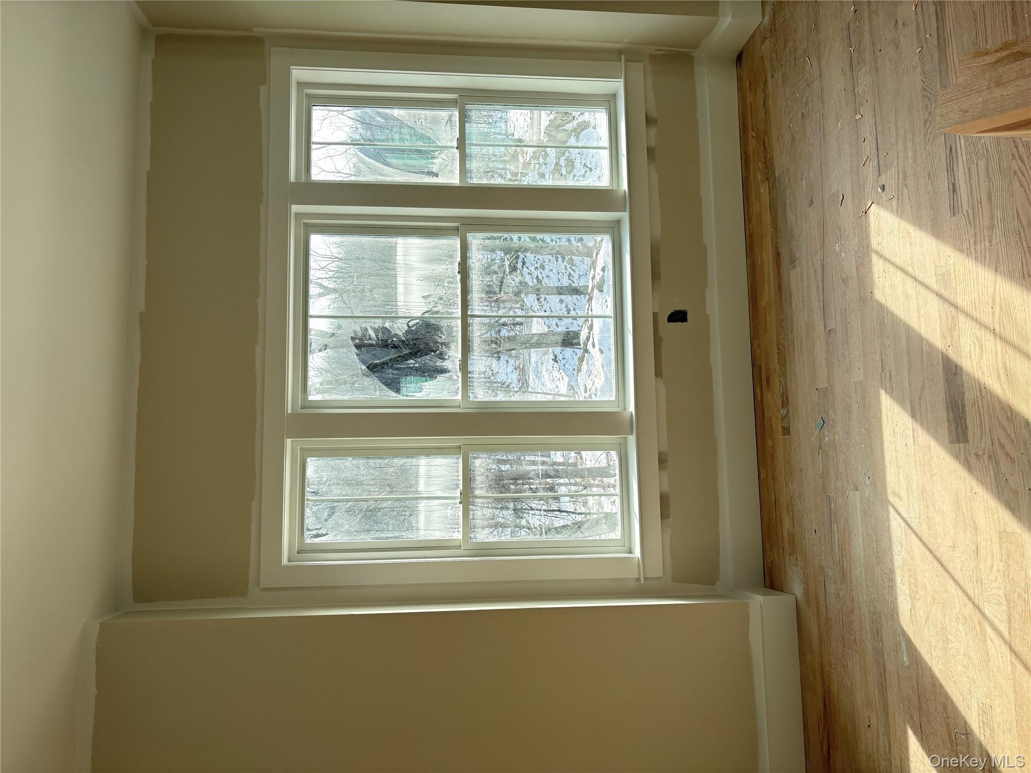 466 Wheeler Road Florida, NY 10921 - Photo 10 of 21 a view of an empty room with a window