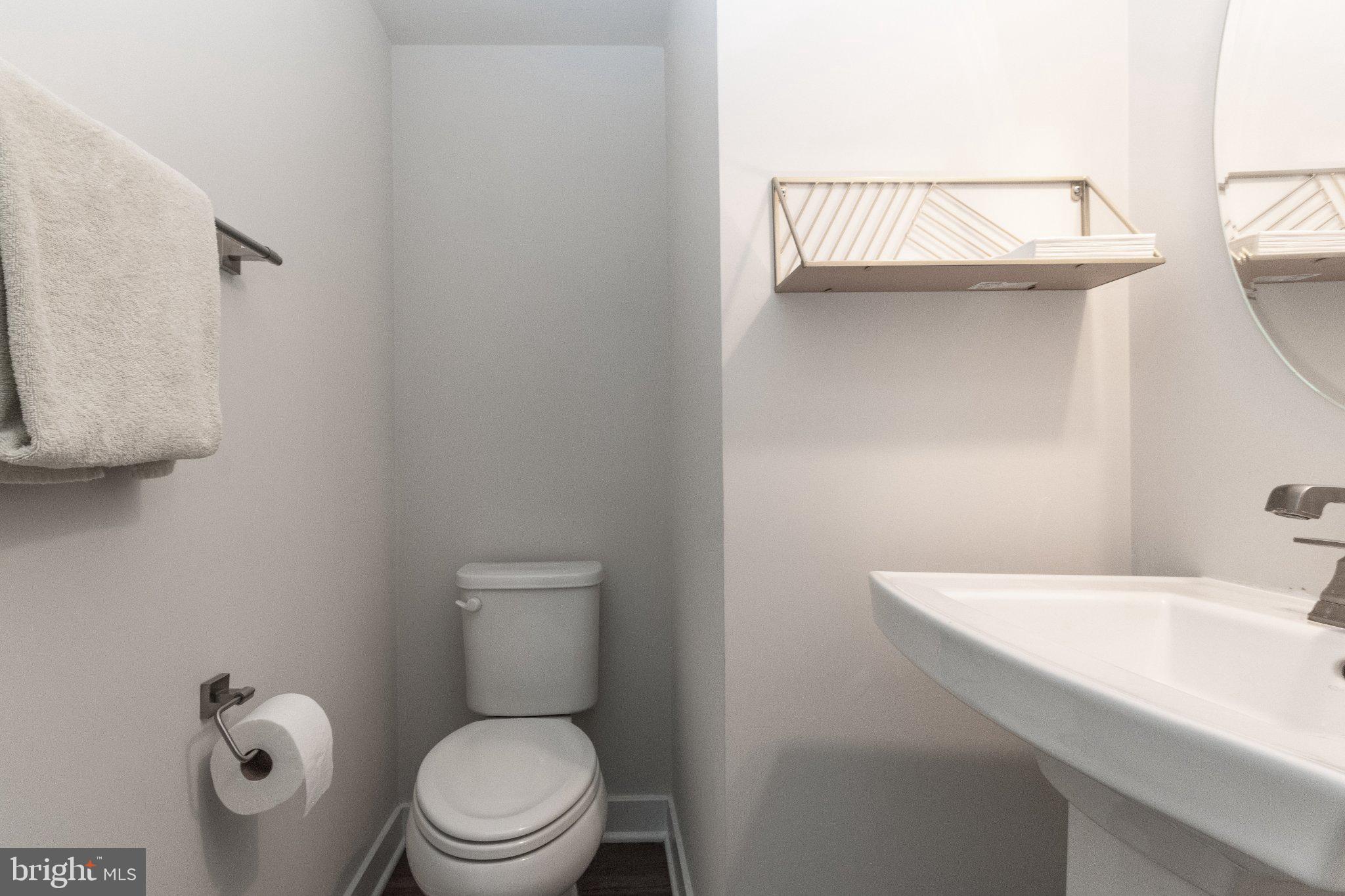 109 Blantons Road Martinsburg, WV 25405 - Photo 12 of 55 a bathroom with a sink a toilet and a window
