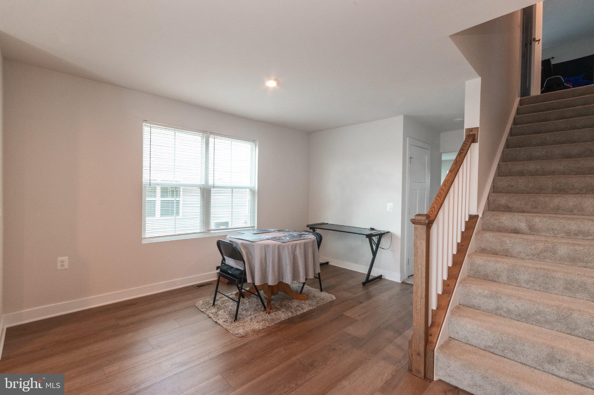 109 Blantons Road Martinsburg, WV 25405 - Photo 17 of 55 a view of a livingroom with furniture and a window