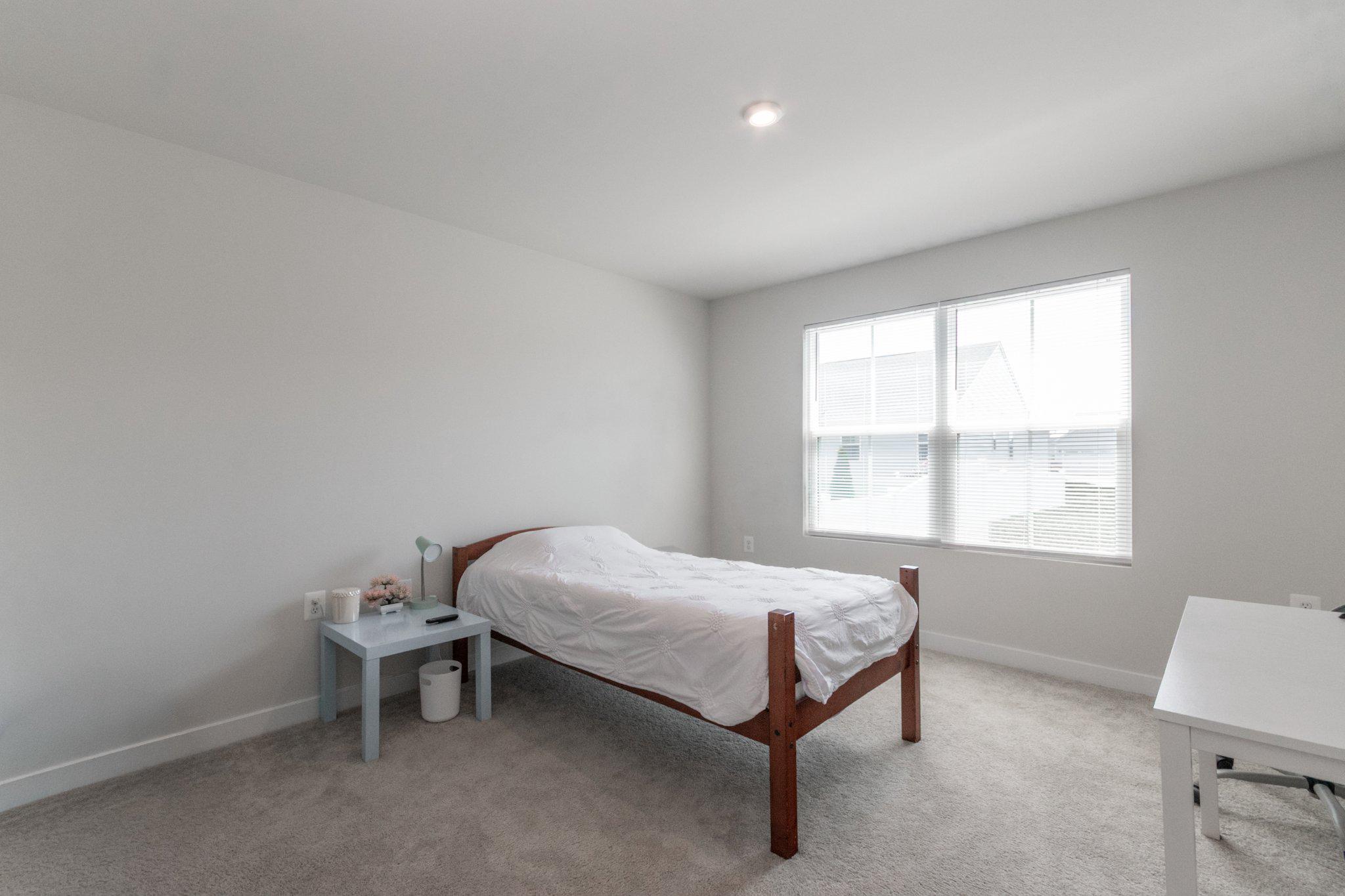 109 Blantons Road Martinsburg, WV 25405 - Photo 30 of 55 a bedroom with a bed and a window