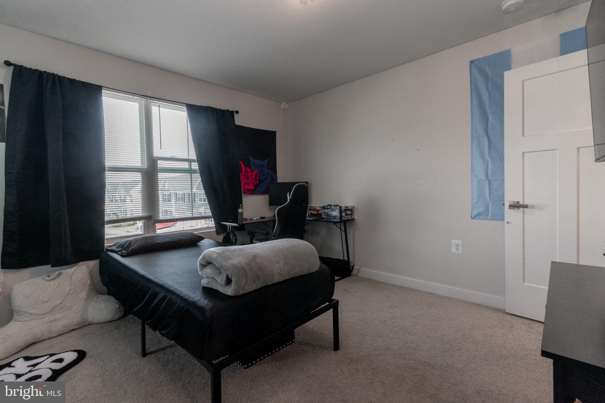 109 Blantons Road Martinsburg, WV 25405 - Photo 38 of 55 a living room with furniture and a flat screen tv