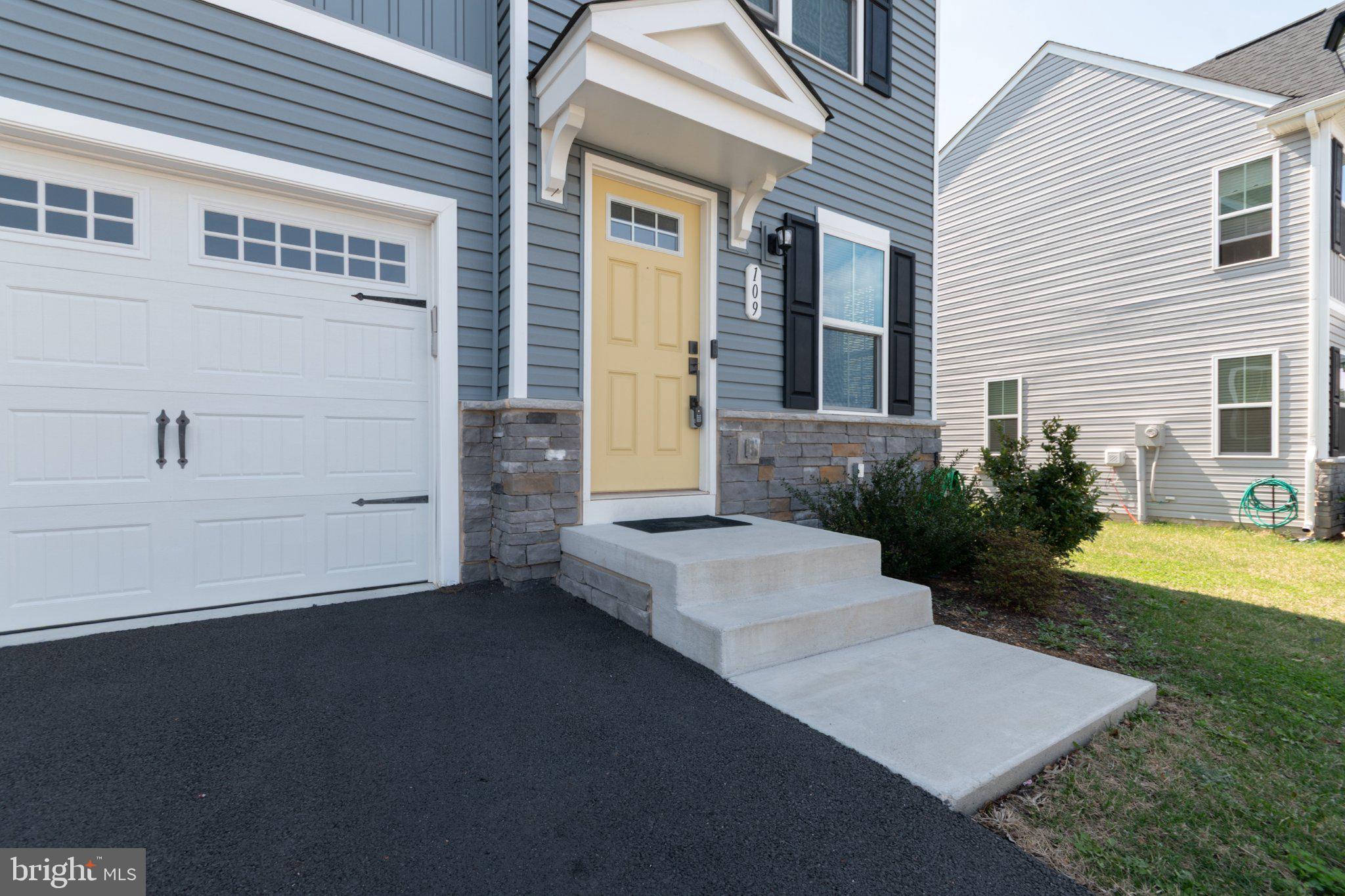 109 Blantons Road Martinsburg, WV 25405 - Photo 4 of 55 a front view of a house with a yard