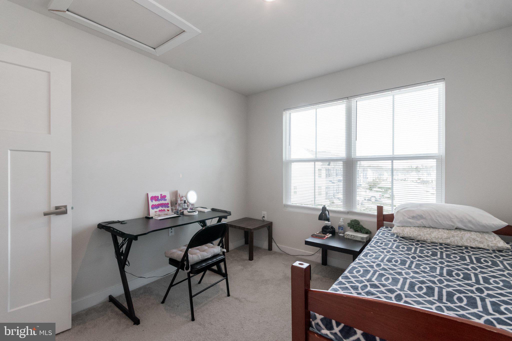 109 Blantons Road Martinsburg, WV 25405 - Photo 45 of 55 a living room with furniture and a window