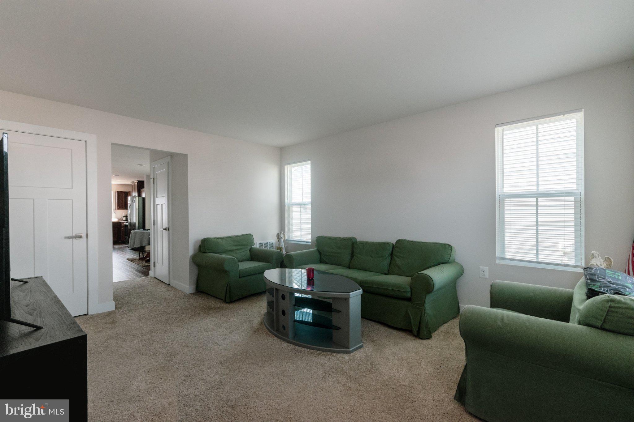 109 Blantons Road Martinsburg, WV 25405 - Photo 8 of 55 a living room with furniture and a window