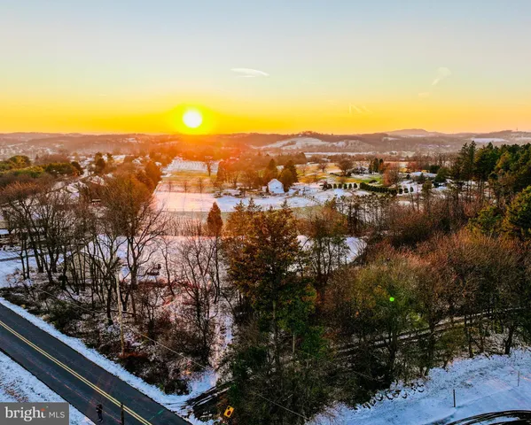 a view of city with ocean