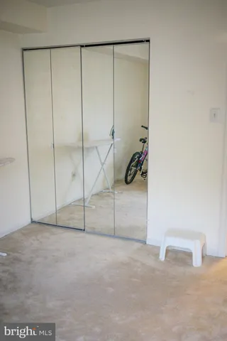 a kitchen with stainless steel appliances a refrigerator sink and cabinets