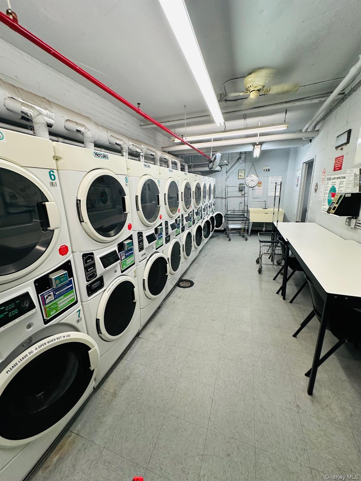 3121 Middletown Road, Unit 6H Bronx, NY 10461 - Photo 22 of 24 a utility room with dryer and washer