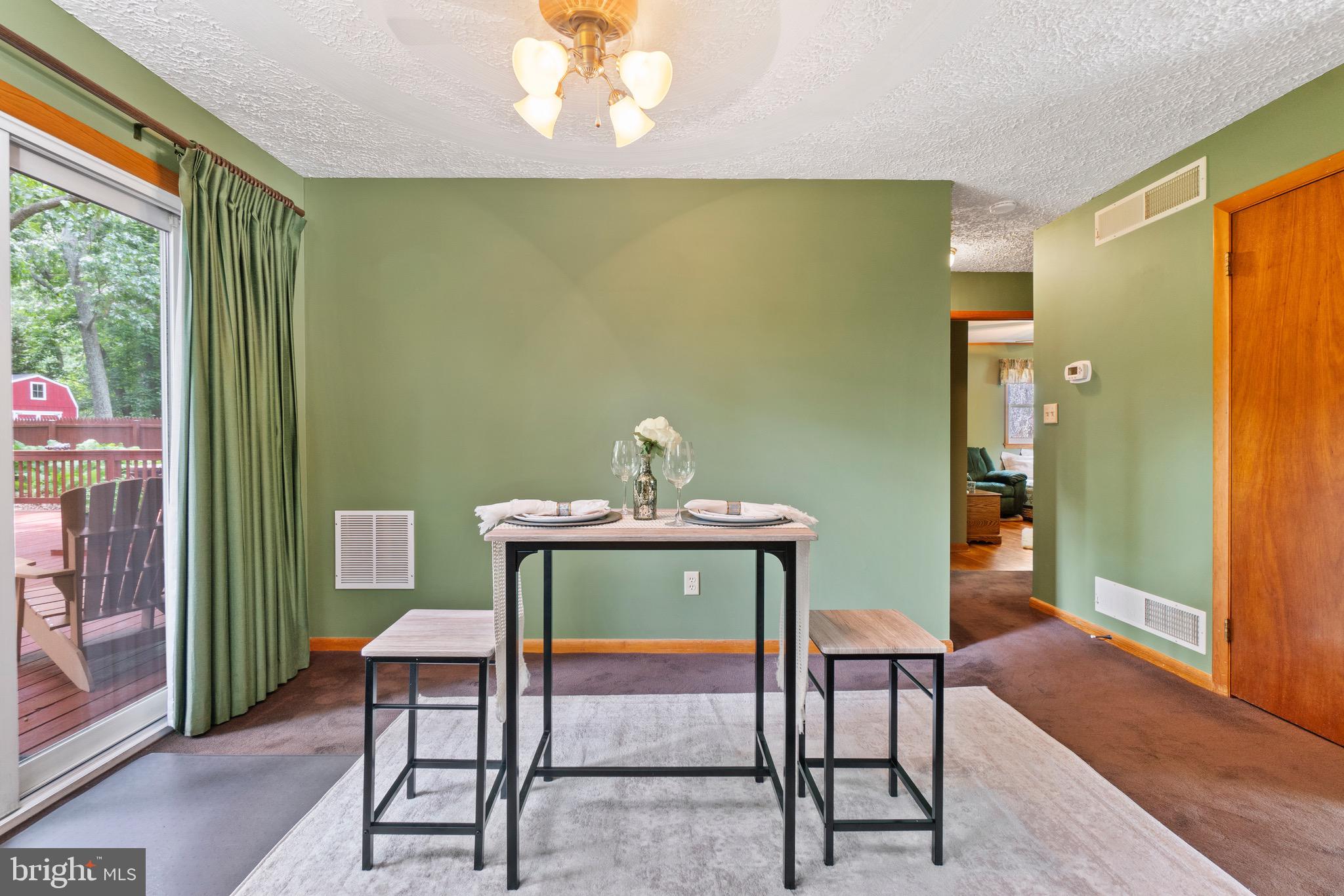 815 Lucky Road Severn, MD 21144 - Photo 16 of 40 Dining area ( wood door is access to LL )