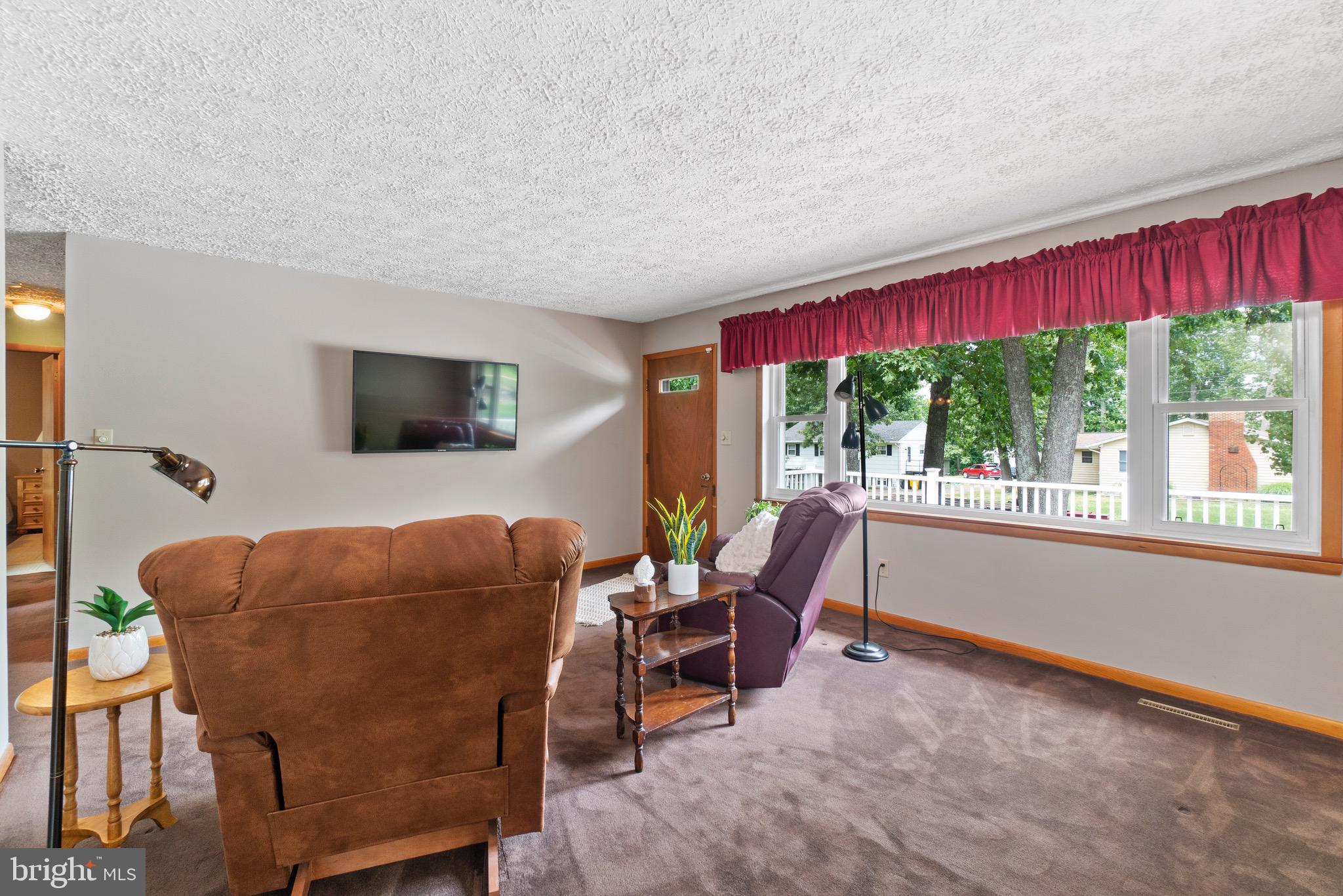 815 Lucky Road Severn, MD 21144 - Photo 7 of 40 Large picture window accents this LR space