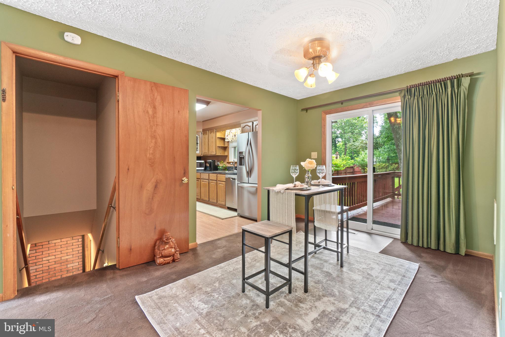 815 Lucky Road Severn, MD 21144 - Photo 10 of 40 DR area with slider to deck & access to LL