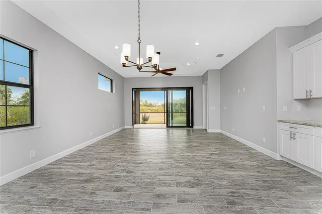 a view of an empty room with window
