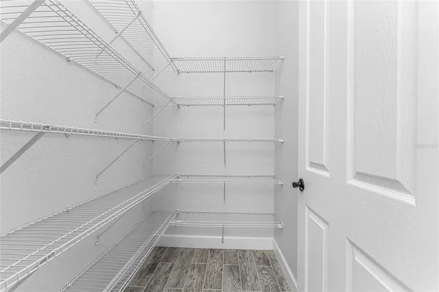 a view of a room with racks on the wall