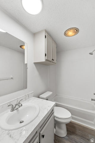 2875 North 400 West, Unit 7 Layton, UT 84041 - Photo 20 of 29 Bathroom featuring a vanity with a white faux marble countertop, an undermount sink, and a chrome faucet
