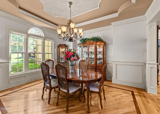 a view of balcony with furniture and trees in the background
