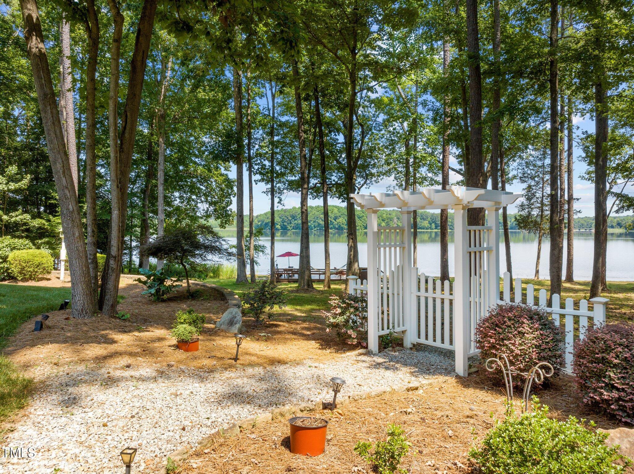 901 Edgewater Drive Garner, NC 27529 - Photo 2 of 72 a view of a outdoor space and garden