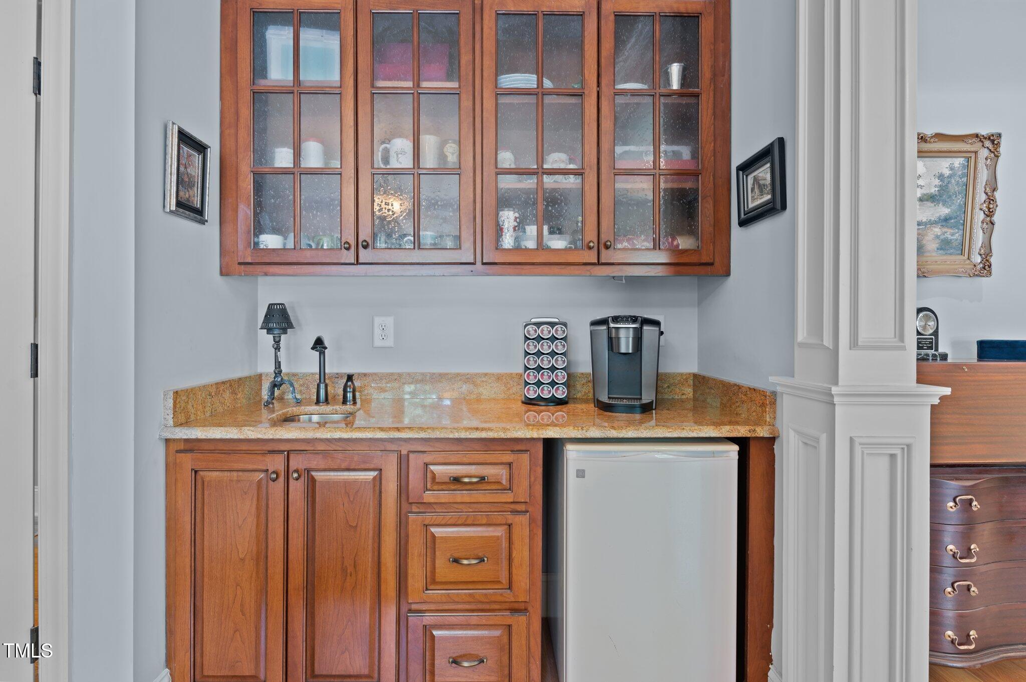 901 Edgewater Drive Garner, NC 27529 - Photo 27 of 72 a kitchen with a sink and cabinets